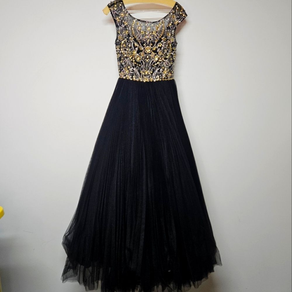 Elegant Black and Gold Evening Gown By Sherri Hill Size 4